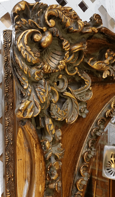 Rococo frame reproduction - corner close-up showing faux wood finish.